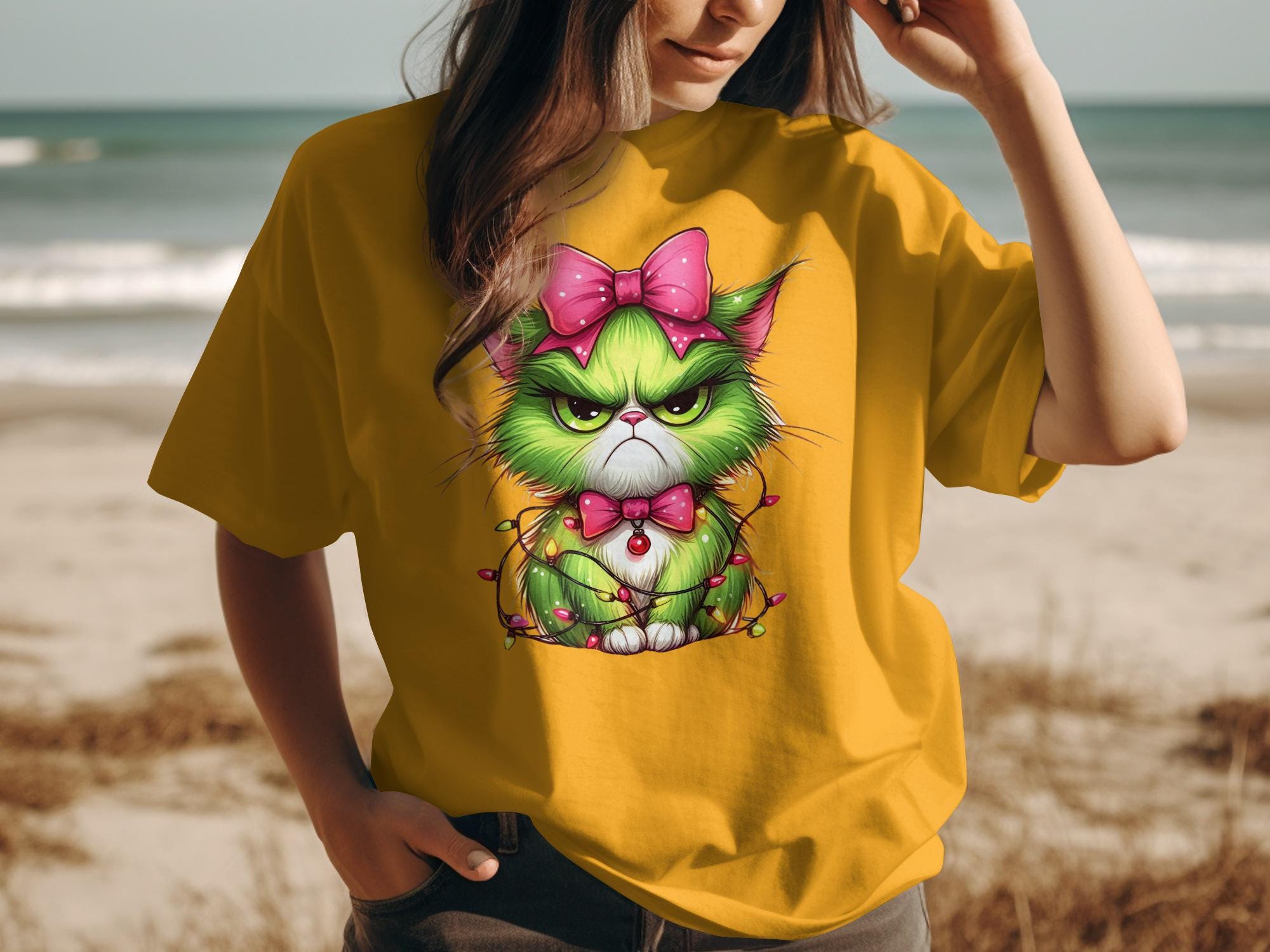 Cute Grumpy Cat T-Shirt on Beach, Fun Summer Graphic Tee, Yellow Shirt with Pink Bow, Must-Have Beachwear, Casual Beach Outfit