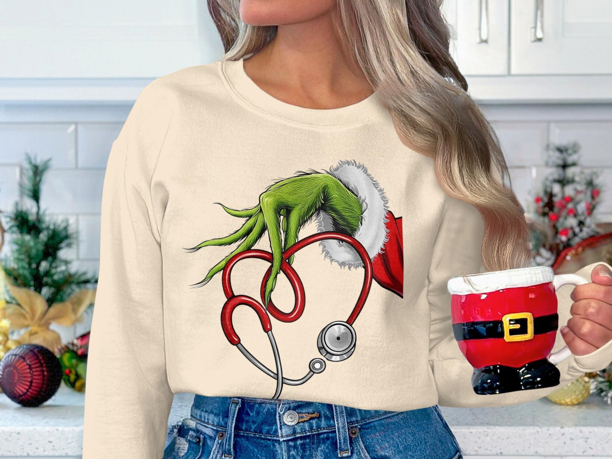 Christmas Sweatshirt, Grinch Hand Holding Stethoscope Sweater, Holiday Nurse Gift, Festive Graphic Pullover, Cute Holiday Wear